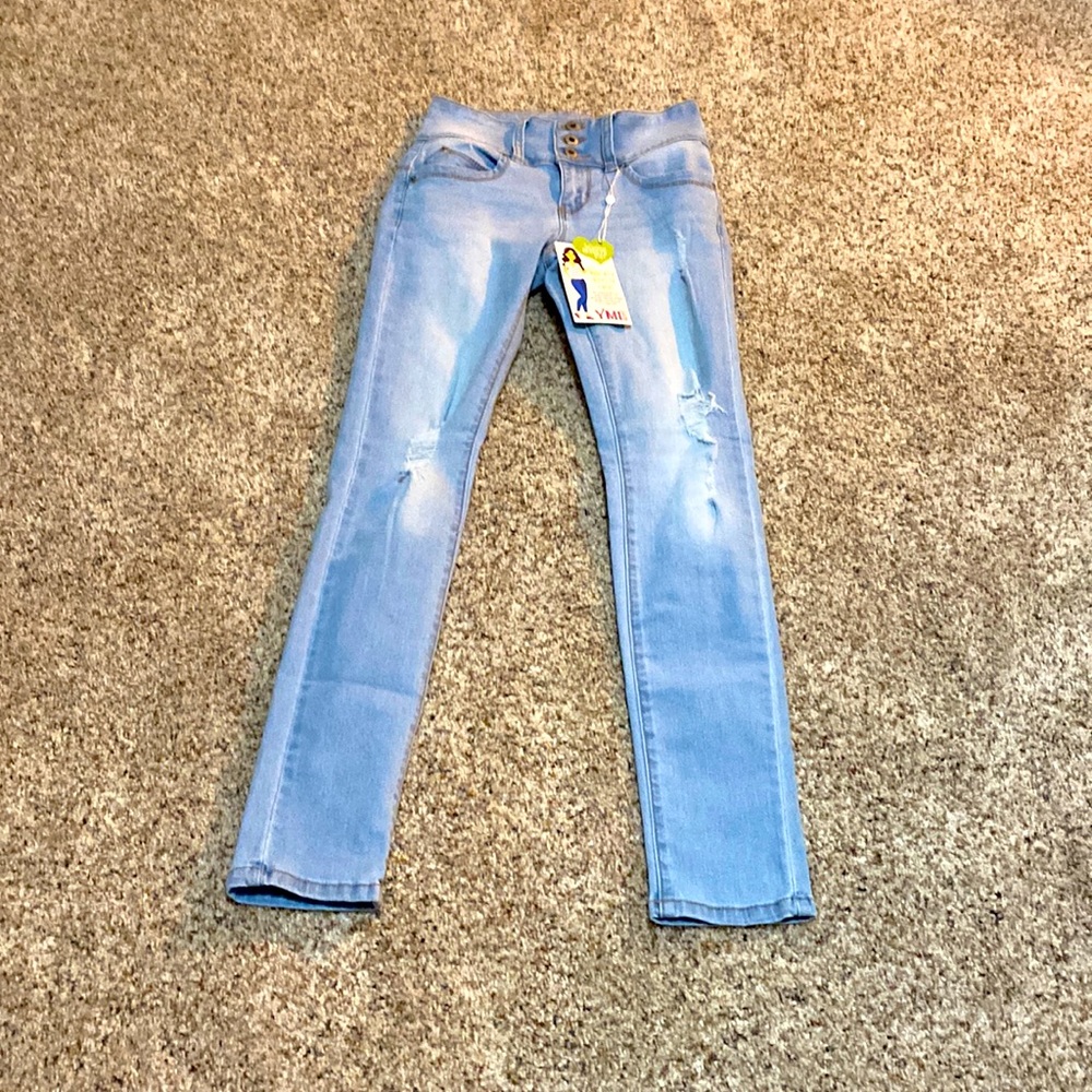 New light blue jeans with front and back pockets still has tag